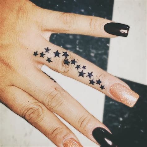 star finger tattoo|what do star tattoos symbolize.